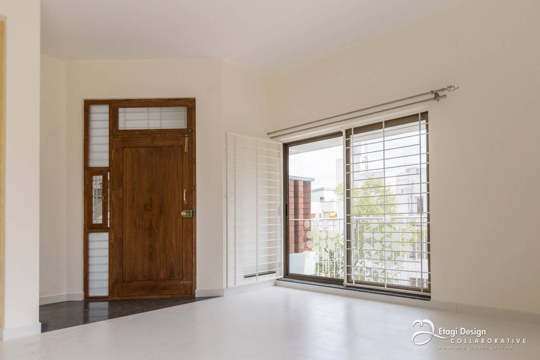 Rekha Raju Residence, Etagi Design Collaborative Etagi Design Collaborative Окна и двери в стиле модерн