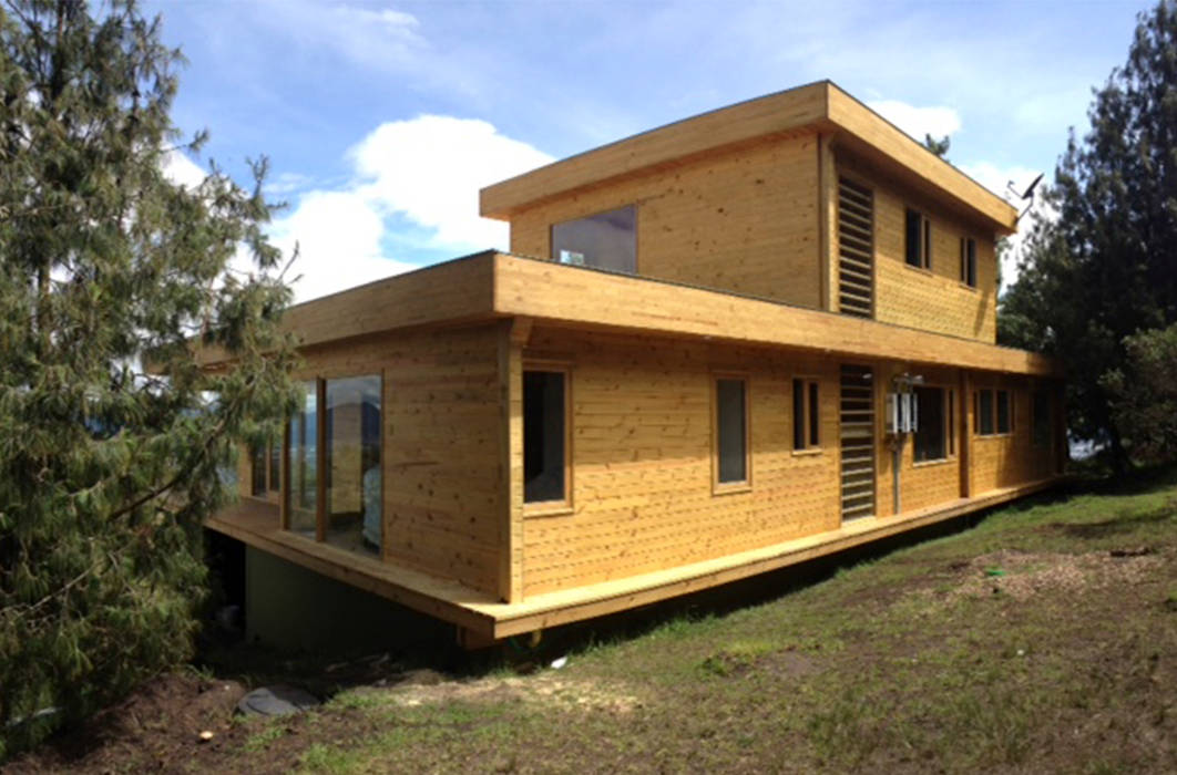 Vivienda suburbana en madera, Taller de Ensamble SAS Taller de Ensamble SAS Modern home Wood Wood effect
