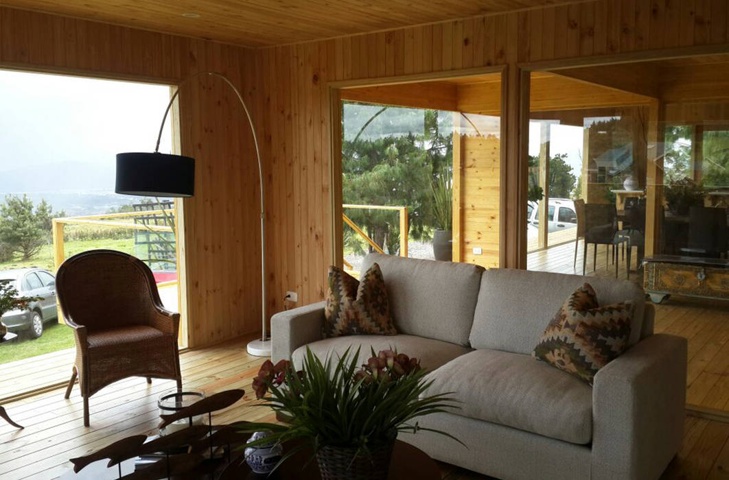 La calidad de los espacios interiores en madera Taller de Ensamble SAS Salas modernas Madera Acabado en madera madera,casas,construcción,sala