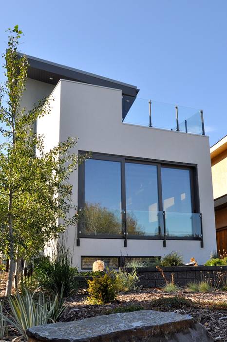 front facace E3 Architecture Inc. Modern houses