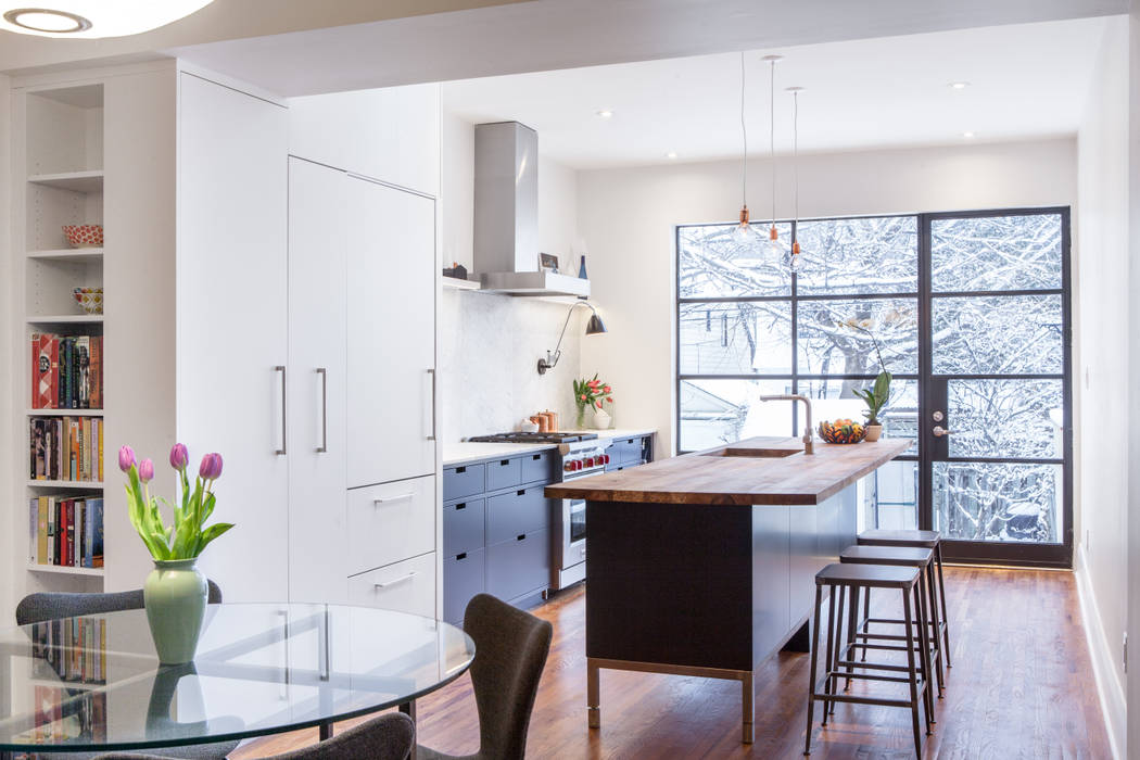 View Looking into Kitchen from Dining Room STUDIO Z Kitchen black windows,blue cabinets,brushed metal stools,cutout handles,Diamond pendant lights,dishwasher drawer,industrial metal windows,LED lighting,,marble backsplash,marble counter top,