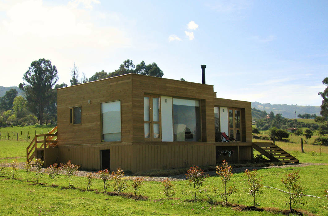 Casa cubica madera, Taller de Ensamble SAS Taller de Ensamble SAS Modern houses Wood Wood effect