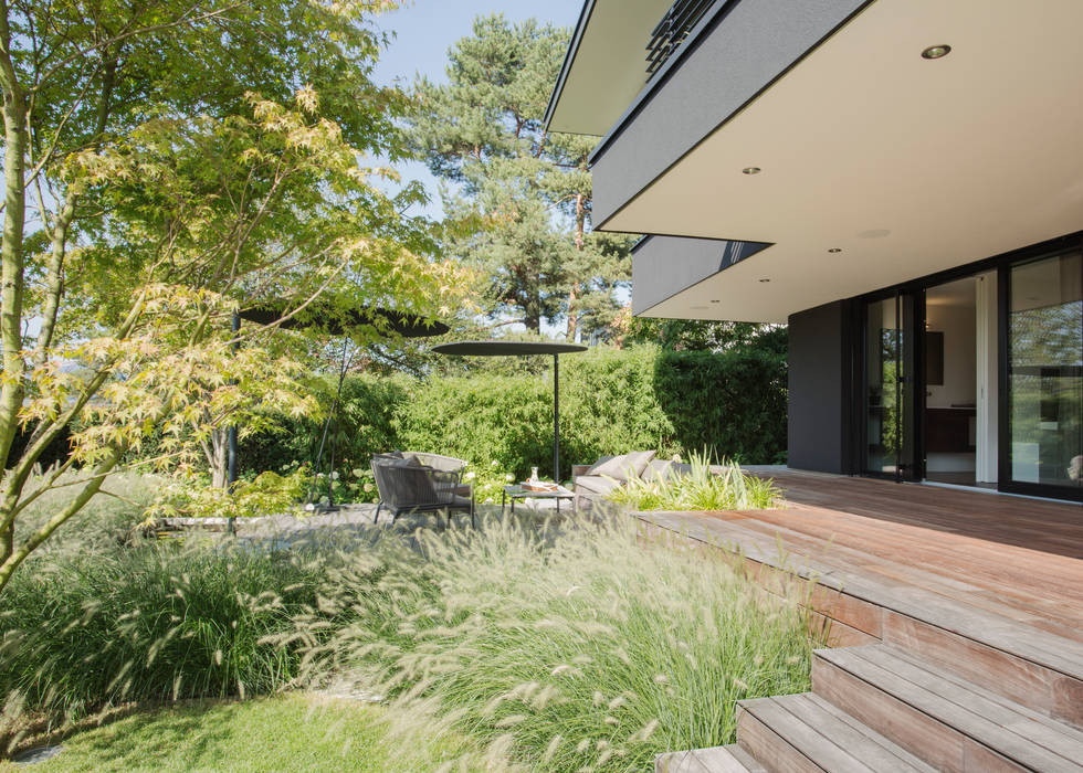 Objekt 336: Traumhaftes Einfamilienhaus mit Panoramablick , meier architekten zürich meier architekten zürich Jardines de estilo moderno Madera Acabado en madera