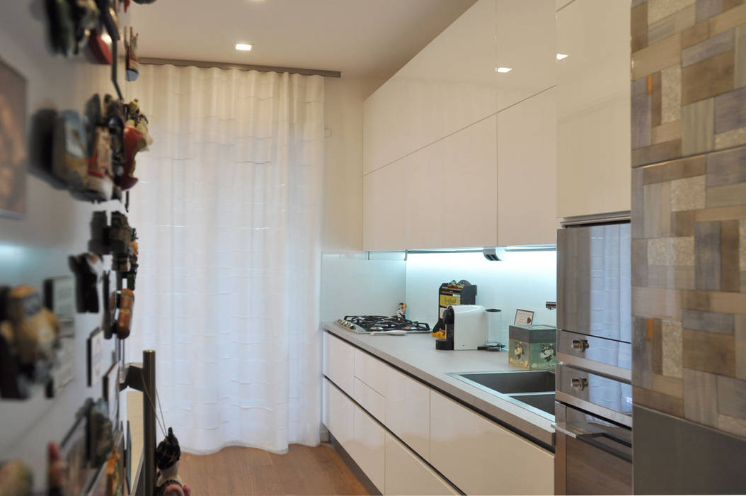 appartamento a roma, evels & papitto - b4architects evels & papitto - b4architects Кухня в скандинавском стиле Дерево Эффект древесины