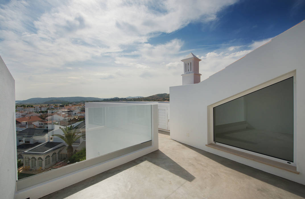 CasadaLila, StudioArte StudioArte Balcones y terrazas minimalistas Ladrillos