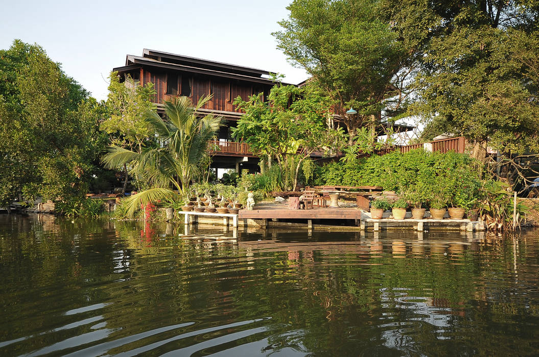 Baan Kong ( Grandfather’s house), บริษัท สถาปนิกชุมชนและสิ่งแวดล้อม อาศรมศิลป์ จำกัด บริษัท สถาปนิกชุมชนและสิ่งแวดล้อม อาศรมศิลป์ จำกัด Country style house Wood Wood effect