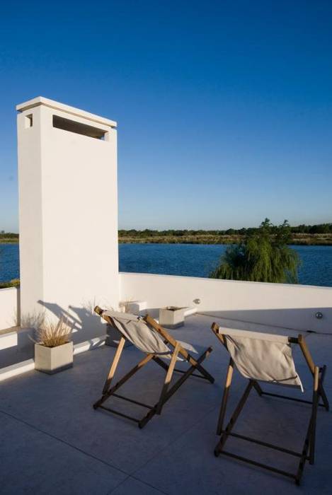 Terraza al lago CIBA ARQUITECTURA Balcones y terrazas modernos: Ideas, imágenes y decoración terraza,lago