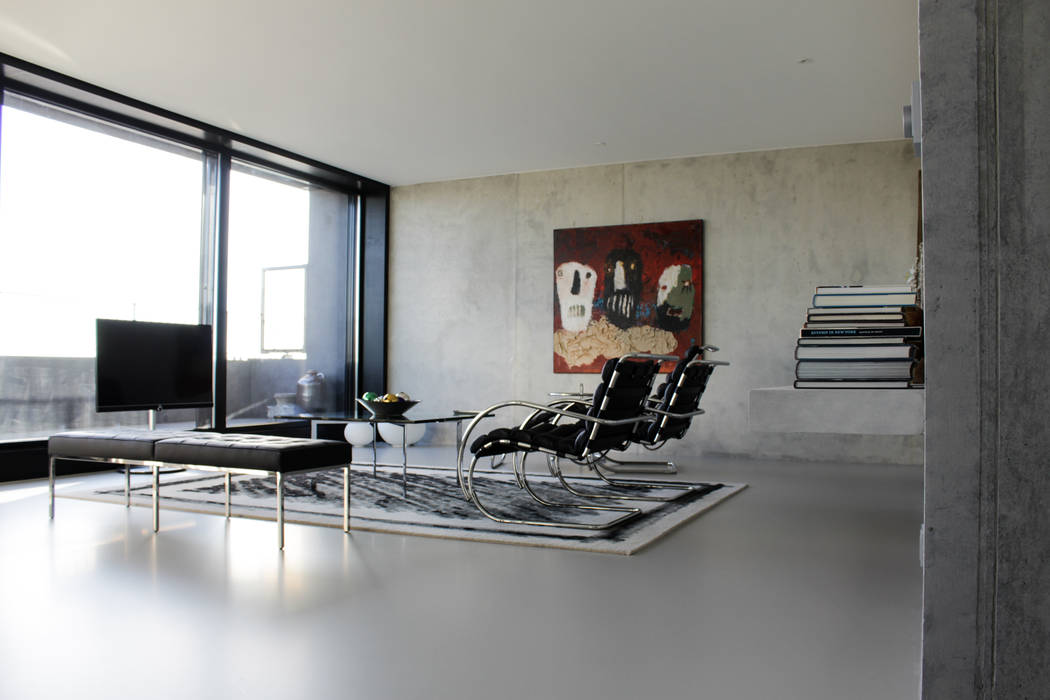 Gietvloer in moderne loft in Amsterdam homify Moderne muren & vloeren Kunststof gietvloer