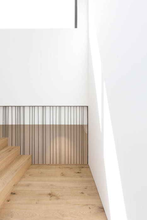 homify Pasillos, vestíbulos y escaleras de estilo moderno Madera Acabado en madera