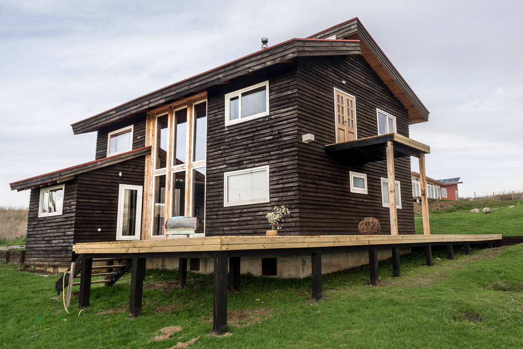 Fachada Casa Almazan Arquitectura y Construcción Casas de estilo rural Madera Acabado en madera terraza,casa de madera,espacio,estilo propio,calidad de vida,fachada de madera