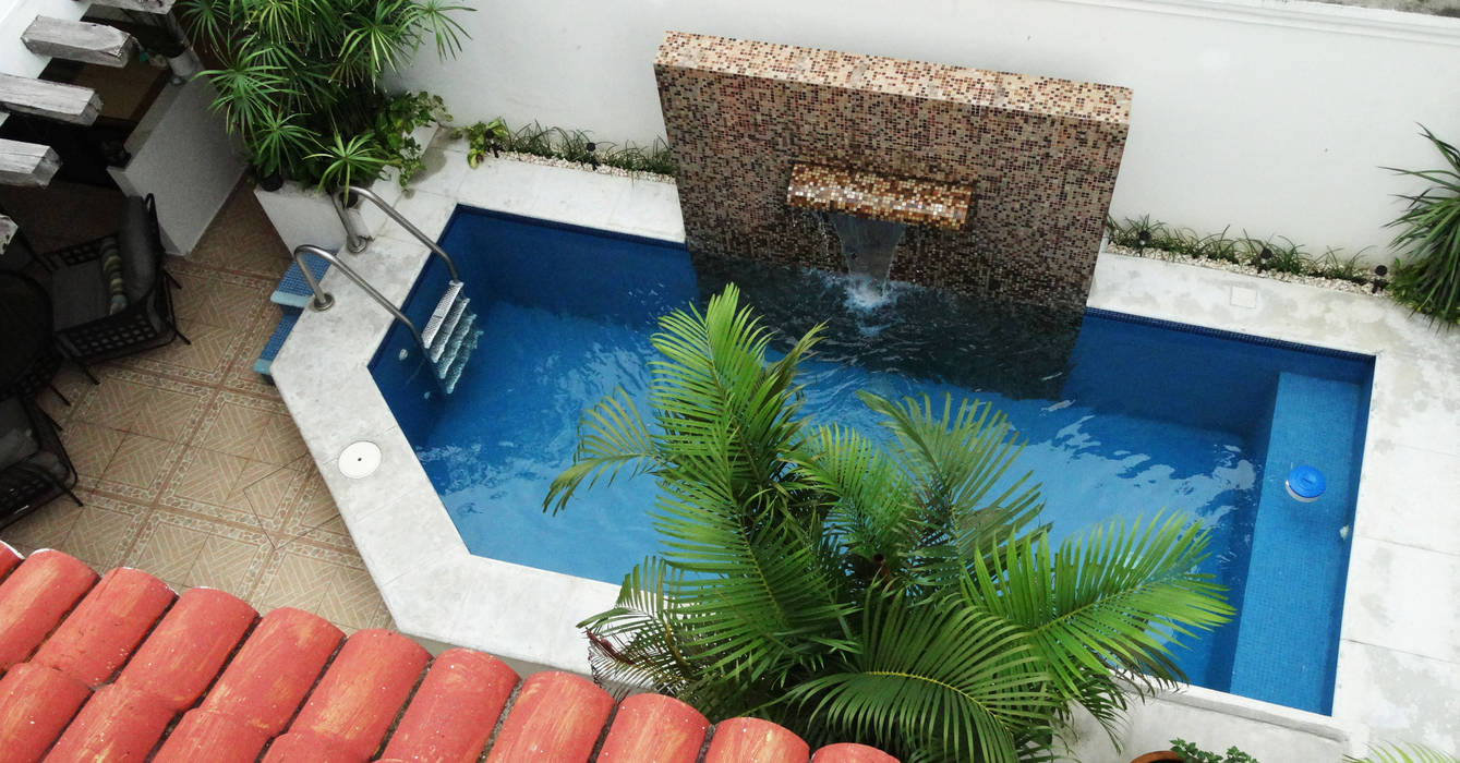DESPUES Alberca con area de estar: de estilo tropical por Arq Eduardo Galan, Arquitectura y paisajismo, Tropical