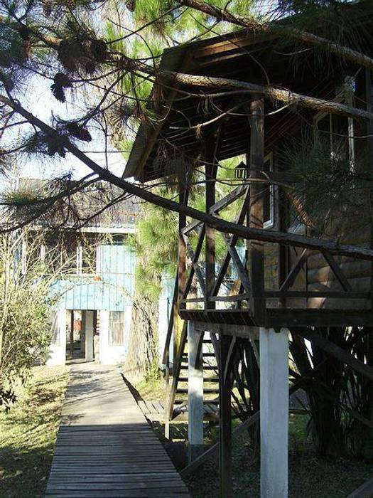 Cabañas de Madera, Carpintería y Decoración La Cucha Carpintería y Decoración La Cucha Casas de estilo rústico