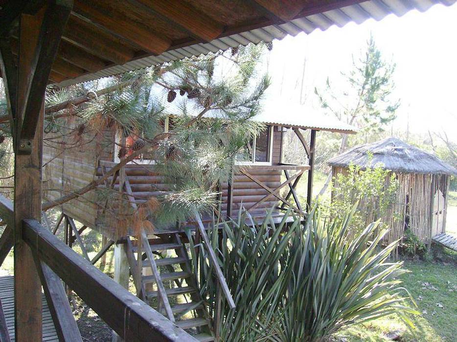 Cabañas de Madera, Carpintería y Decoración La Cucha Carpintería y Decoración La Cucha Rustic style houses