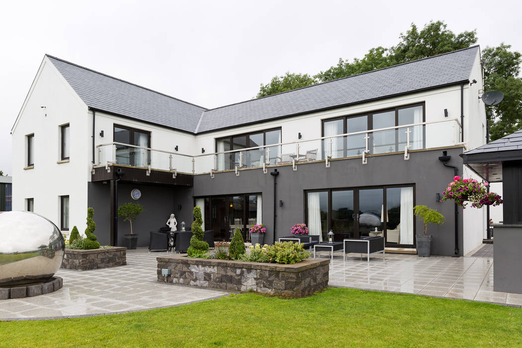 south facing elevation slemish design studio architects Nowoczesne domy external,balcony,landscape,glazed balcony,windows