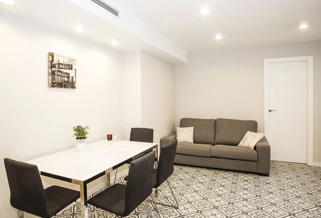 Reforma integral y de mobiliario en calle Còrsega de Barcelona, Grupo Inventia Grupo Inventia Living room Concrete