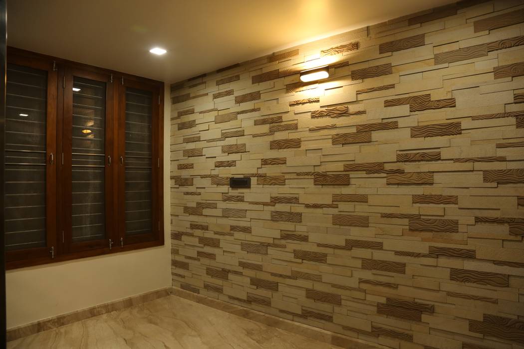 Lobby wall with stone cladding homify Modern houses