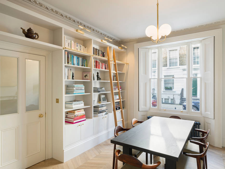 View of library Gundry & Ducker Architecture Eclectic style dining room library ladder,bookshelves