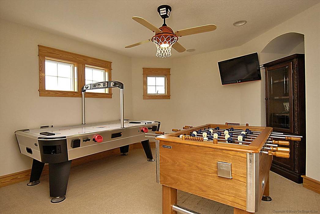 2nd game room with air hockey and Foosball Outer Banks Renovation & Construction Modern media room