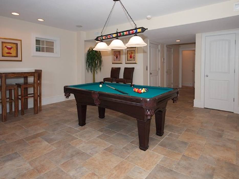 Large game room with pool table Outer Banks Renovation & Construction Modern style media rooms