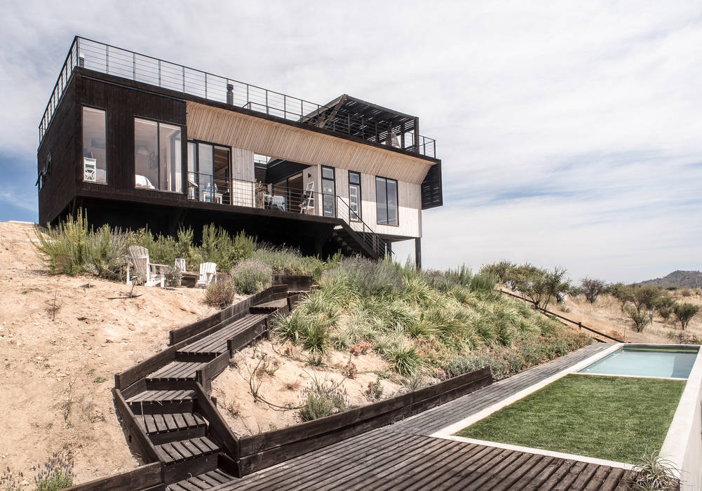 The Folding House, B+V Arquitectos B+V Arquitectos Jardines de estilo moderno Madera Acabado en madera