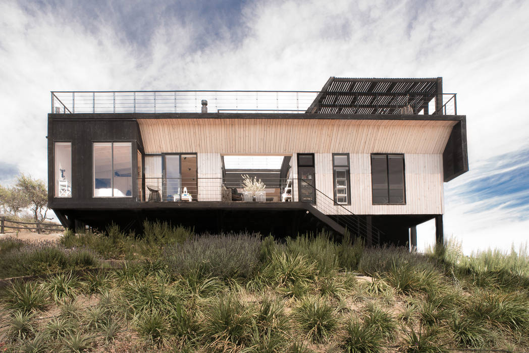 The Folding House, B+V Arquitectos B+V Arquitectos 모던스타일 주택 우드 우드 그레인