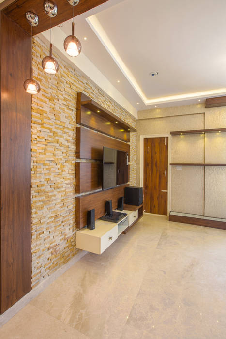 3 BHK apartment interiors in rustic look theme , In Built Concepts is now FABDIZ In Built Concepts is now FABDIZ Classic style living room Plywood TV stands & cabinets