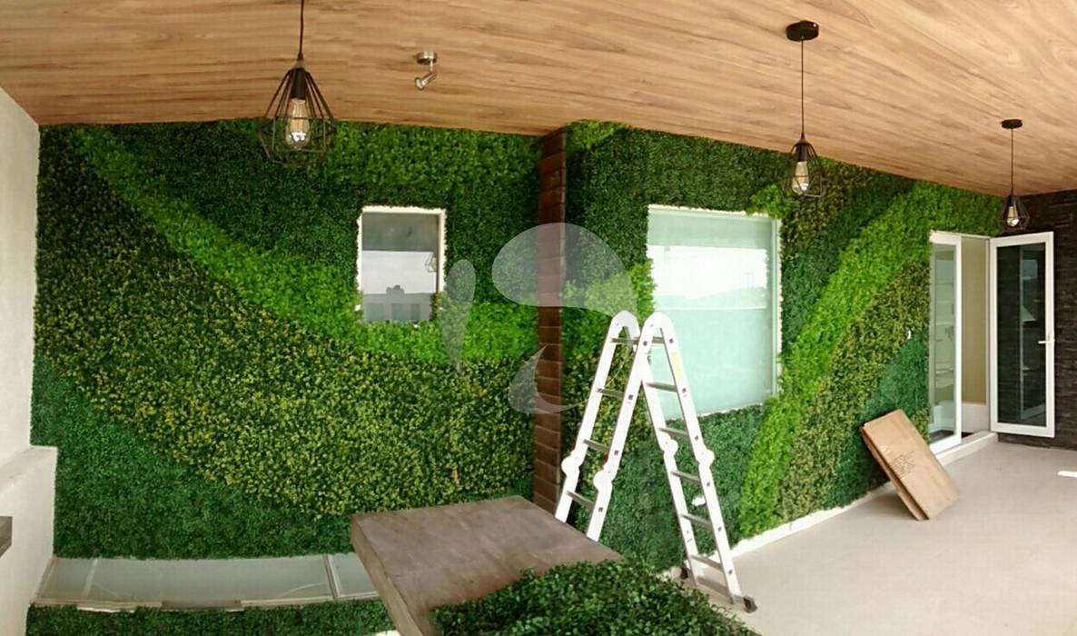 MURO VERDE ARTIFICIAL CON DISEÑO ORGANICO homify Espacios comerciales Espacios comerciales