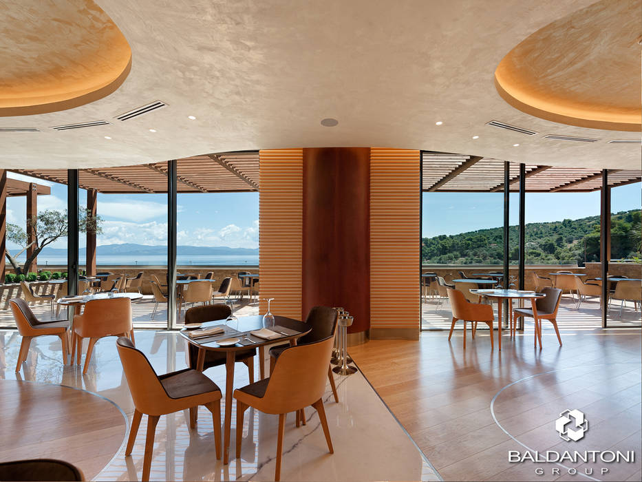Ristorante Portofino, Paliouri, Grecia, Baldantoni Group Baldantoni Group Modern dining room Silver/Gold