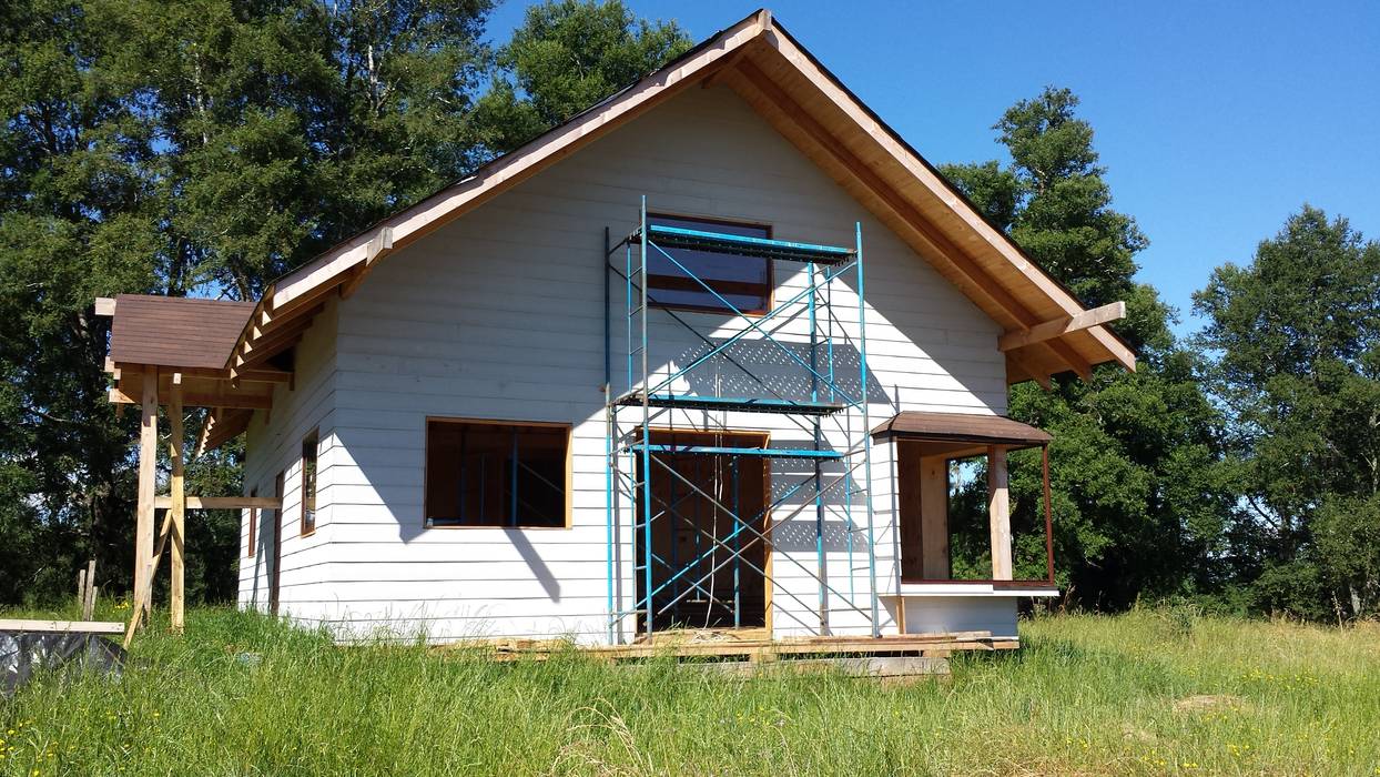 Exterior, fachada principal Arquitectura y Construcción Chinquel Casas de estilo rústico Madera Acabado en madera