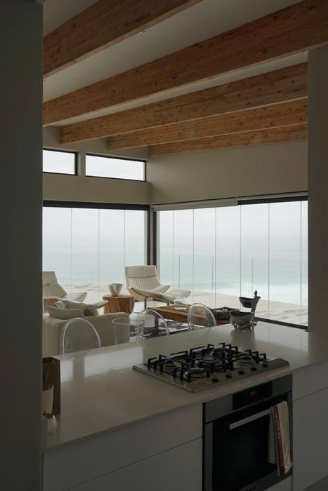 Brenton House view from kitchen XO Architects Inc. Living room Glass