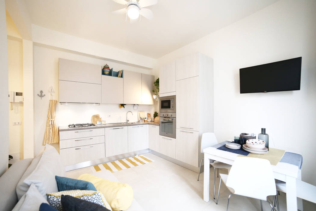 Un apartamento pequeño con una gran personalidad - Hogar dulce hogar, Civicocinquestudio Civicocinquestudio Cocinas de estilo mediterráneo