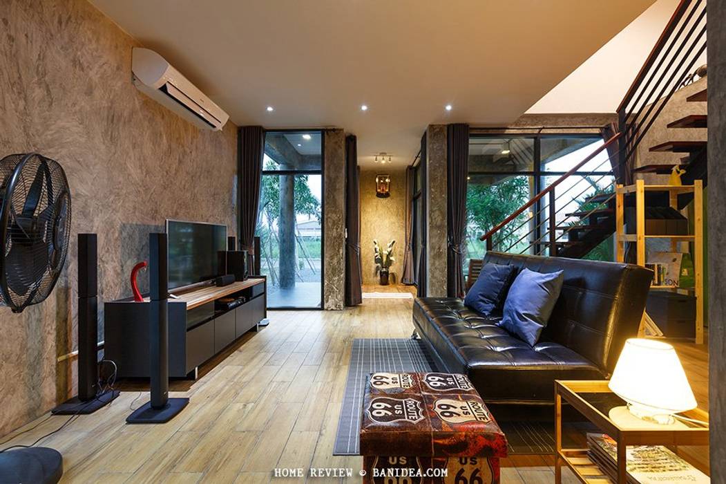 ​บ้านพักตากอากาศ ชลบุรี homify ห้องนั่งเล่น