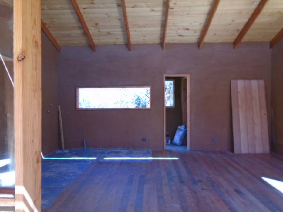 CASA CALEU CREARCO Casas estilo moderno: ideas, arquitectura e imágenes Madera Acabado en madera casa de madera