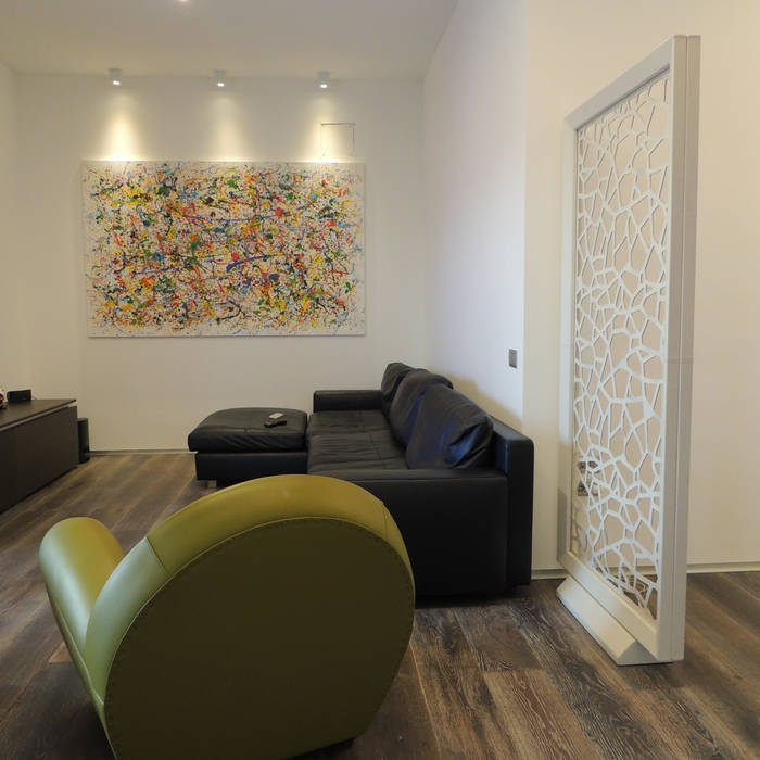 Appartamento a tutto colore, Nadia Moretti Nadia Moretti 现代客厅設計點子、靈感 & 圖片 皮革 Grey 沙發與扶手椅