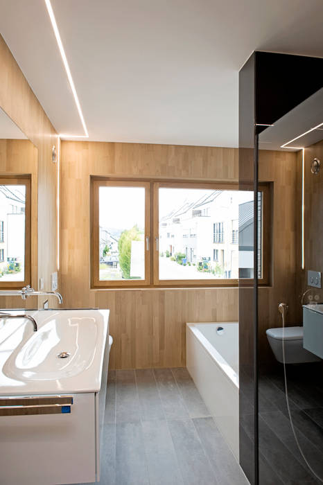 Ökologisches Traumhaus aus Beton und Massivholz, Maisons Loginter Maisons Loginter Moderne badkamers