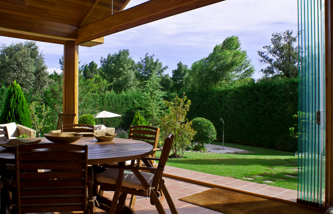 homify Balcones y terrazas de estilo moderno cortina cristal,cerramientos madrid