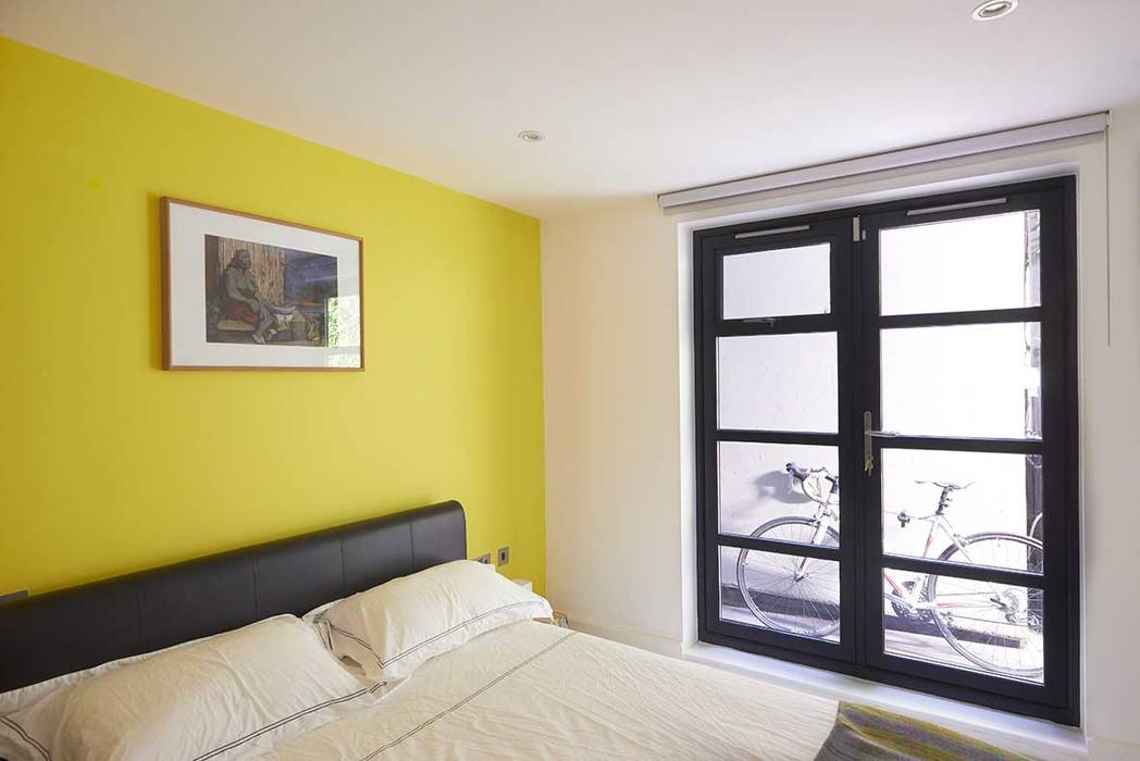 London duplex guestroom ESTHERRICO Design & Businness Modern Bedroom yellow,colour wall,leather header,modern,london,clerknwell