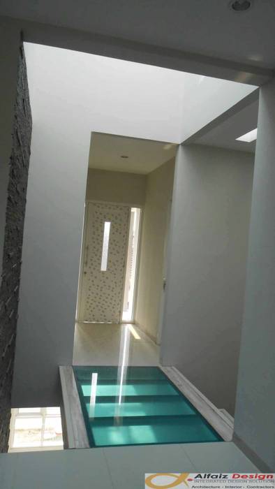 Rumah Jatiwaringin, Alfaiz Design Alfaiz Design Koridor & Tangga Tropis