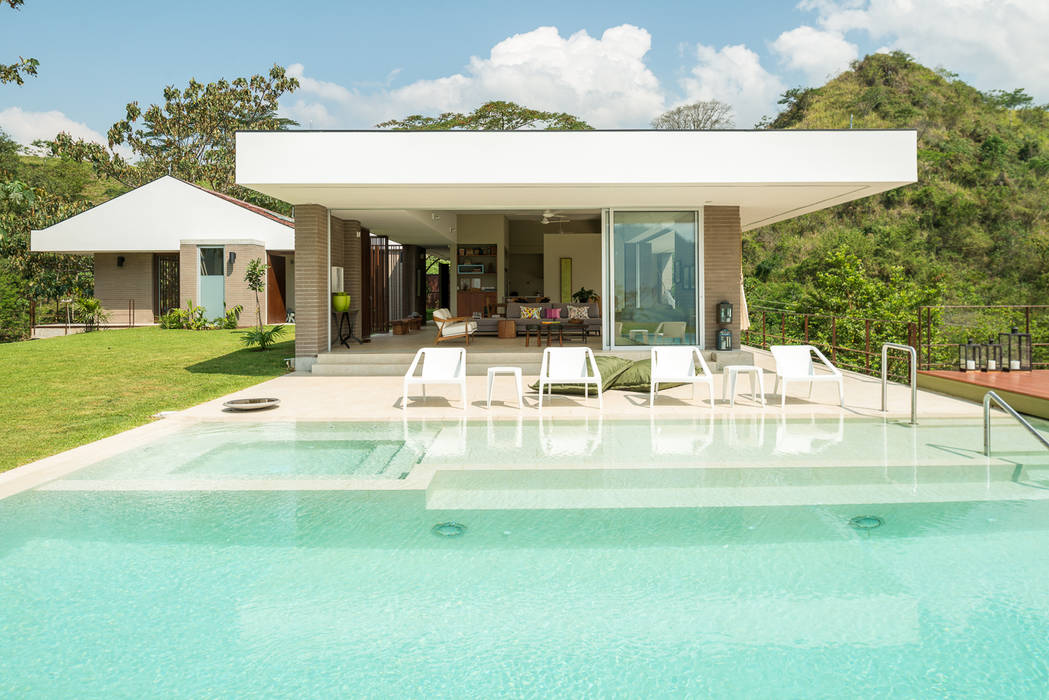 Casa La Siria, toroposada arquitectos sas toroposada arquitectos sas Piscine tropicale