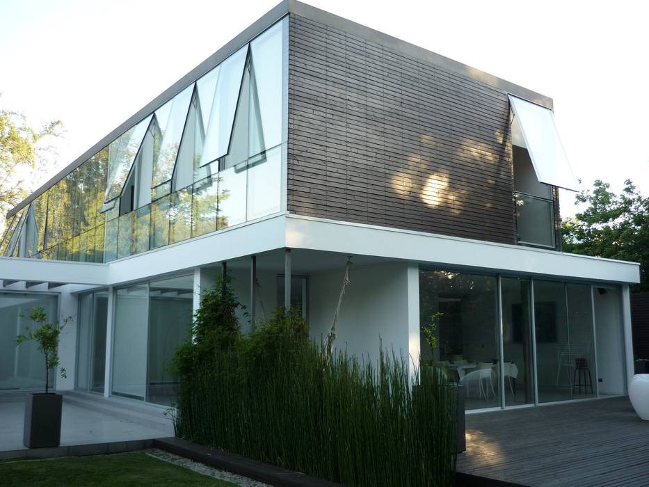 Casa Joullié Claudia Tidy Arquitectura Casas de estilo minimalista Madera Acabado en madera termopanel,madera