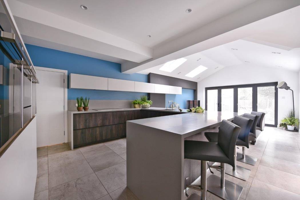 Mr & Mrs Marshall's kitchen Diane Berry Kitchens Modern kitchen alno,corian,neff,bar,stools,bifold,blue,ushape,manchester,diane berry