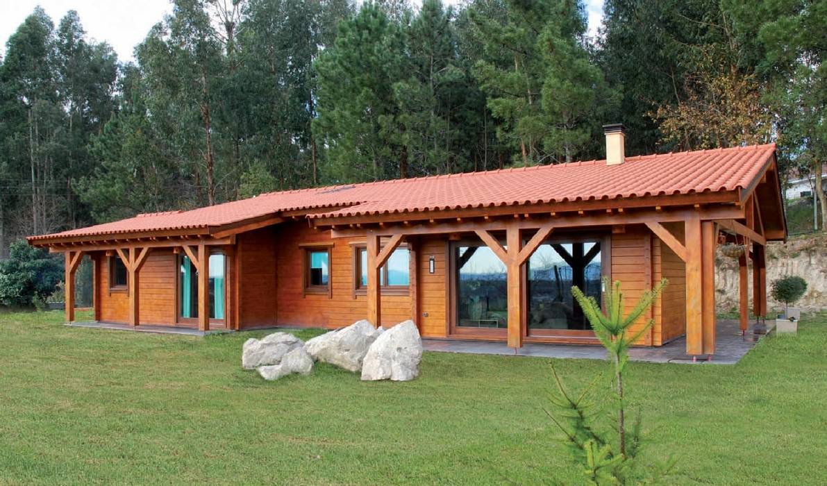 RUSTICASA | 100 projetos | Portugal + Espanha, RUSTICASA RUSTICASA Chalets & maisons en bois Bois massif Multicolore