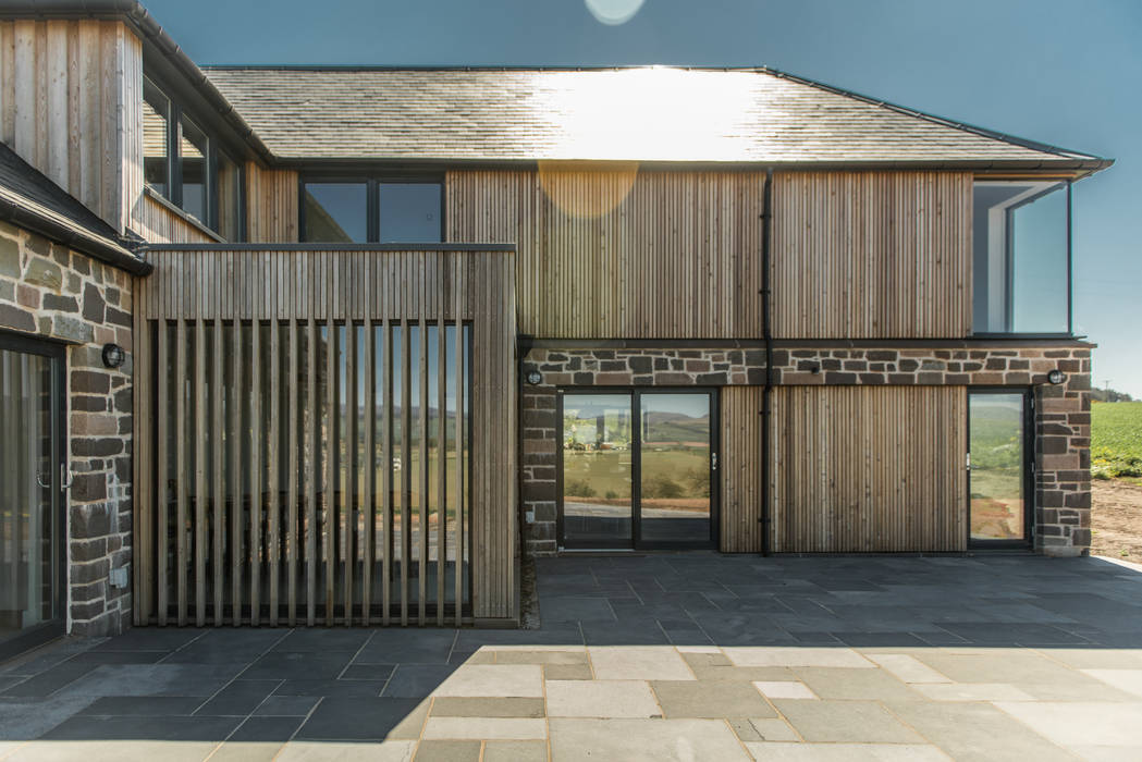 Timber and stone clad balances modern and traditional Woodside Parker Kirk Architects Patios Timber,cladding,battens,patio,Stone house,Rural design,Farm steading,development