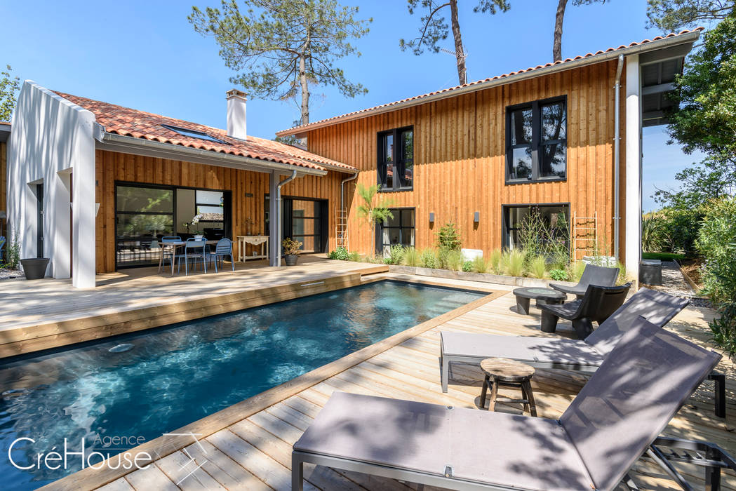 Création d’une maison individuelle avec piscine, Agence CréHouse Agence CréHouse Casas de estilo moderno