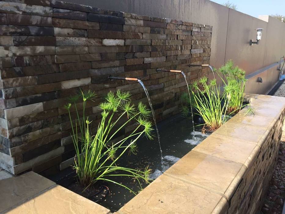 Copper spout water feature Acton Gardens Country style garden Stone stone cladding,copper pipe,water feature,water plants