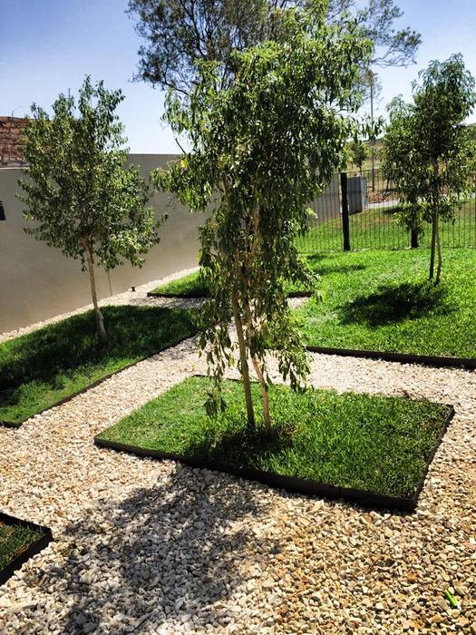 Modern features with clean geometric lines Acton Gardens Modern Garden lawn boxes,tree,garden feature,clean lines,gravel,small spaces,metal