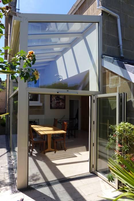 Glass Extension for dining area Style Within Moderne Küchen glass extension,open plan,kitchen diner,conservatory,oak dining table,patio tiles,porcelain tiles,bifold doors,patio doors,aluminium frame