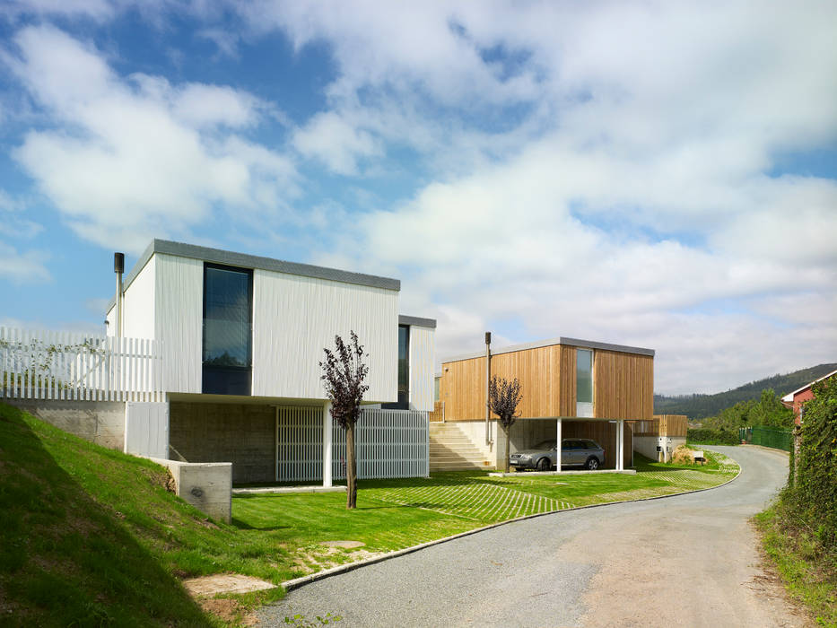 CASA MODULAR DE HORMIGÓN FRAN & RENATA, ADDOMO ADDOMO Casas de estilo moderno