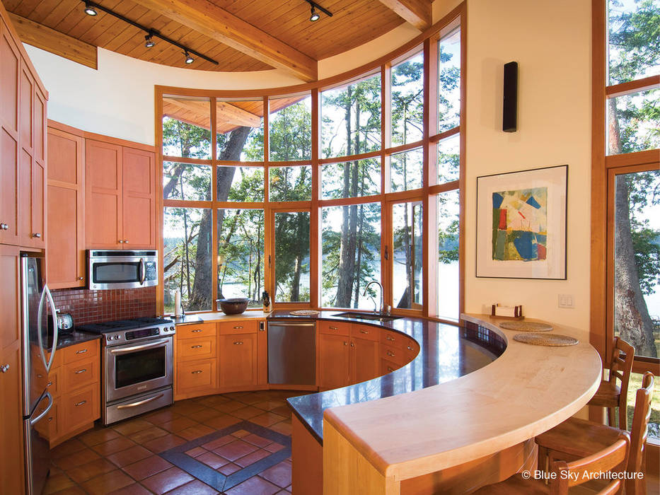 Circular Kitchen Helliwell + Smith • Blue Sky Architecture Modern kitchen Property,Cabinetry,Furniture,Table,Wood,Interior design,Plant,Countertop,Architecture,Kitchen appliance