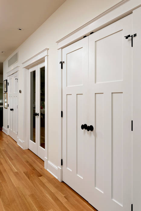 Stylish First-Floor Bungalow Renovation in Arlington, VA BOWA - Design Build Experts Minimalist corridor, hallway & stairs